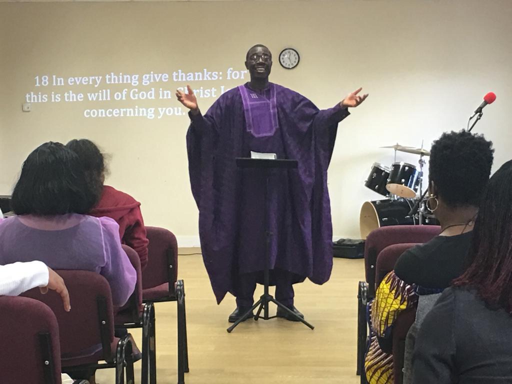 Pastor preaching at a Sunday gathering